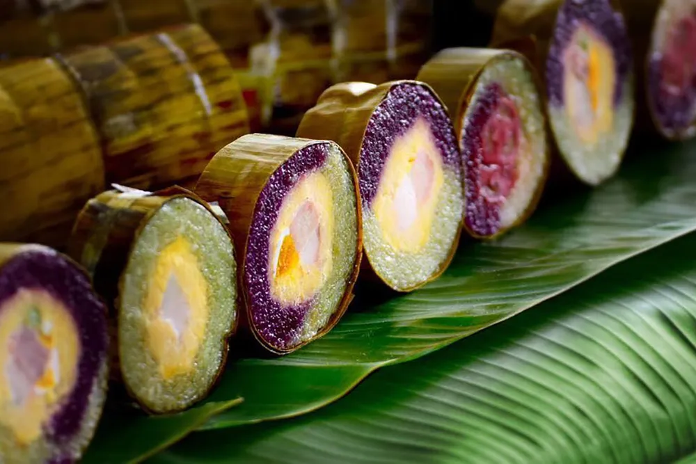 Bánh tét lá cẩm mang nét đặc trưng ẩm thực tại Cần Thơ